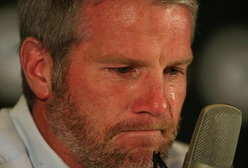 GREEN BAY, WI - MARCH 6: Quarterback Brett Favre of the Green Bay Packers announces his retirement at a press conference at Lambeau Field March 6, 2008 in Green Bay, Wisconsin. (Photo by Jonathan Daniel/Getty Images)