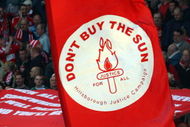 LIVERPOOL, ENGLAND - APRIL 11:  Liverpool fans display banners in reference to the Hillsborough disaster during the Barclays Premier League match between Liverpool and Blackburn at Anfield on April 11, 2009 in Liverpool, England. On April 15 it will be the 20th anniversary of the Hillsborough disaster, the bells of Liverpools two cathedrals will ring 96 times in memory of the 96 fans who lost their lives. At 3:06pm, exactly 20 years since the match was abandoned Liverpools public transport will stop for 2 minutes. There will also be a memorial service on the Kop where 96 candles will be lit and a representative from each family will be awarded the freedom of the city. (Photo by Clive Rose/Getty Images)