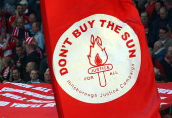 LIVERPOOL, ENGLAND - APRIL 11:  Liverpool fans display banners in reference to the Hillsborough disaster during the Barclays Premier League match between Liverpool and Blackburn at Anfield on April 11, 2009 in Liverpool, England. On April 15 it will be the 20th anniversary of the Hillsborough disaster, the bells of Liverpools two cathedrals will ring 96 times in memory of the 96 fans who lost their lives. At 3:06pm, exactly 20 years since the match was abandoned Liverpools public transport will stop for 2 minutes. There will also be a memorial service on the Kop where 96 candles will be lit and a representative from each family will be awarded the freedom of the city. (Photo by Clive Rose/Getty Images)