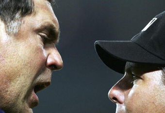 LOS ANGELES - JULY 24:  Manager Bruce Bochy #15 of the San Diego Padres argues his ejection with first base umpire James Hoye in the 12th inning against the the Los Angeles Dodgers on July 24, 2006 at the Rogers Centre in Toronto, Canada.  (Photo by Harry How/Getty Images)