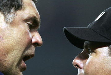 LOS ANGELES - JULY 24:  Manager Bruce Bochy #15 of the San Diego Padres argues his ejection with first base umpire James Hoye in the 12th inning against the the Los Angeles Dodgers on July 24, 2006 at the Rogers Centre in Toronto, Canada.  (Photo by Harry How/Getty Images)