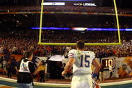 MIAMI - JANUARY 08: Quarterback Tim Tebow #15 of the Florida Gators runs off of the field after defeating the Oklahoma Sooners in the FedEx BCS National Championship Game at Dolphin Stadium on January 8, 2009 in Miami, Florida. The Gators won the game by a score of 24-14. (Photo by Donald Miralle/Getty Images)