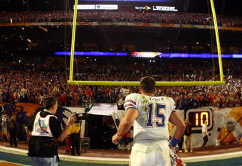 MIAMI - JANUARY 08:  Quarterback Tim Tebow #15 of the Florida Gators runs off of the field after defeating the Oklahoma Sooners in the FedEx BCS National Championship Game at Dolphin Stadium on January 8, 2009 in Miami, Florida. The Gators won the game by a score of 24-14.  (Photo by Donald Miralle/Getty Images)