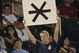 NEW YORK - AUGUST 6:  A New York Yankees fan holds up a sign with an asterisk as David Ortiz of the Boston Red Sox comes up to bat in the eighth inning against the New York Yankees August 6, 2009 in New York City.  The Yankees defeated the Red Sox 13-6.  (Photo by Paul Bereswill/Getty images)