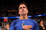 DENVER - MAY 05:  Mark Cuban, owner of the Dallas Mavericks observes the national anthem prior to facing the Denver Nuggets in Game Two of the Western Conference Semifinals during the 2009 NBA Playoffs at Pepsi Center on May 5, 2009 in Denver, Colorado. The Nuggets defeated the Mavericks 117-105. NOTE TO USER: User expressly acknowledges and agrees that, by downloading and or using this photograph, User is consenting to the terms and conditions of the Getty Images License Agreement.  (Photo by Doug Pensinger/Getty Images)