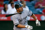 ANAHEIM, CA - MAY 25:  Carlos Quentin #20 of the Chicago White Sox hits an RBI double in the first inning against the Los Angeles Angels of Anaheim at Angel Stadium on May 25, 2009 in Anaheim, California.  (Photo by Jeff Gross/Getty Images)