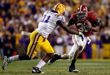 BATON ROUGE, LA - NOVEMBER 08:  Glen Coffee #38 of the Alabama Crimson Tide tries to avoid a tackle by Kelvin Sheppard #11 of the Louisiana State University Tigers on November 11, 2008 at Tiger Stadium in Baton Rouge, Louisiana. The Tide defeated the Tigers 27-21 in overtime.  (Photo by Chris Graythen/Getty Images)