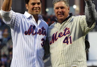 NEW YORK - APRIL 13:  Former Mets players Mike Piazza and Tom Seaver greet fans before throwing out the first pitch of the San Diego Padres against the New York Mets during opening day at Citi Field on April 13, 2009 in the Flushing neighborhood of the Queens borough of New York City. This is the first regular season MLB game being played at the new venue which replaced Shea stadium as the Mets home field.  (Photo by Jim McIsaac/Getty Images)