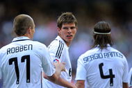 MADRID, SPAIN - MARCH 22: Klaas Jan Huntelaar of Real Madrid celebrates with Arjen Robben and Sergio Ramos after scoring Real's second goal during the La Liga match between Real Madrid and UD Almeria at the Santiago Bernabeu stadium on March 22, 2009 in Madrid, Spain. (Photo by Denis Doyle/Getty Images)