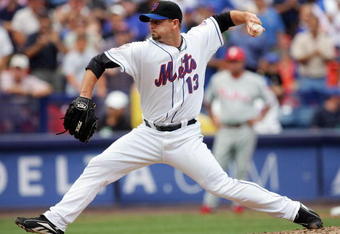 NEW YORK - JULY 24:  Billy Wagner #13 of the New York Mets pitches against the Philadelphia Phillies on July 24, 2008 at Shea Stadium in the Flushing neighborhood of the Queens borough of New York City. The Mets defeated the Phillies 3-1.  (Photo by Jim McIsaac/Getty Images)