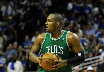 ORLANDO, FL - MAY 14:  Glen Davis #11 of the Boston Celtics looks to pass against the Orlando Magic in Game Six of the Eastern Conference Semifinals during the 2009 NBA Playoffs at Amway Arena on May 14, 2009 in Orlando, Florida.  NOTE TO USER: User expressly acknowledges and agrees that, by downloading and/or using this Photograph, user is consenting to the terms and conditions of the Getty Images License Agreement.  (Photo by Sam Greenwood/Getty Images)