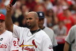 ST. LOUIS, MO - JULY 14:  National League All-Star Albert Pujols of the St. Louis Cardinals tips his hat during introductions before the 2009 MLB All-Star Game at Busch Stadium on July 14, 2009 in St. Louis, Missouri. (Photo by Dilip Vishwanat/Getty Images)