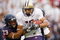 TUSCON - OCTOBER 4:  Jermaine Kearse #15 of the Washington Huskies grips the ball as he is tackled by Marquis Hundley #23 of the Arizona Wildcats on October 4, 2008 at Arizona Stadium in Tucson, Arizona. (Photo by: Gregory Shamus/Getty Images)