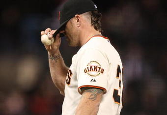SAN FRANCISCO - MAY 14: Brian Wilson #38 of the San Francisco Giants looks on after giving up three runs in the ninth innintagainst the New York Mets during a Major League Baseball game on May14, 2009 at AT&T Park in San Francisco, California. (Photo by Jed Jacobsohn/Getty Images)