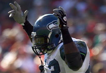 SAN FRANCISCO - OCTOBER 26:  Fullback Leonard Weaver #43 of the Seattle Seahawks celebrates his second touchdown of the game against the San Francisco 49ers in the third quarter at Candlestick Park on October 26, 2008 in San Francisco, California. The Seahawks defeated the 49ers 34-13. (Photo by Jeff Gross/Getty Images)