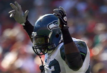 SAN FRANCISCO - OCTOBER 26:  Fullback Leonard Weaver #43 of the Seattle Seahawks celebrates his second touchdown of the game against the San Francisco 49ers in the third quarter at Candlestick Park on October 26, 2008 in San Francisco, California. The Seahawks defeated the 49ers 34-13. (Photo by Jeff Gross/Getty Images)