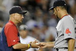 NEW YORK - AUGUST 6:  Manager Terry Francona of the Boston Red Sox takes the ball from pitcher John Smoltz #29 as he takes him out of the game in the fourth inning against the New York Yankees on August 6, 2009 at Yankee Stadium in the Bronx borough of New York City. The Yankees defeated the Red Sox 13-6.  (Photo by Paul Bereswill/Getty images)