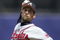 NEW YORK - MAY 07:  John Smoltz #29 of the Atlanta Braves delivers a pitch against the New York Mets on May 7, 2006 at Shea Stadium in the Flushing neighborhood of the Queens borough of New York City. The Braves defeated the Mets 13-3.  (Photo by Jim McIsaac/Getty Images)