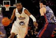 PHOENIX - FEBRUARY 13:  Kevin Durant #35 of the Sophomore team drives to the basket against Rudy Fernandez #5 of the Rookie team during the T-Mobile Rookie Challenge & Youth Jam part of 2009 NBA All-Star Weekend at US Airways Center on February 13, 2009 in Phoenix, Arizona.  NOTE TO USER: User expressly acknowledges and agrees that, by downloading and or using this photograph, User is consenting to the terms and conditions of the Getty Images License Agreement.  (Photo by Ronald Martinez/Getty Images)