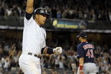NEW YORK - AUGUST 07:  Alex Rodriguez #13 of the New York Yankees celebrates a walk off home run in the 15th inning as first baseman Victor Martinez #41 of the Boston Red Sox walks off the field on August 7, 2009 at Yankee Stadium in the Bronx borough of New York City.  The New York Yankees defeated the Boston Red Sox 2-0. (Photo by Jeff Zelevansky/Getty Images)
