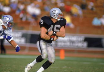 UNDATED: Todd Christensen #46 of the Los Angeles Raiders carries the ball during the game against the Seattle Seahawks at Memorial Coliseum in Los Angeles, California. (Photo by: Stephen Dunn/Getty Images)