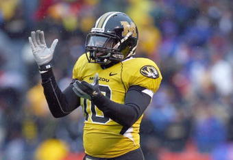 KANSAS CITY, MO - NOVEMBER 29:  Gilbert Moye #10 of the Missouri Tigers celebrates on the field during the game against the Kansas Jayhawks on November 29, 2008 at Arrowhead Stadium in Kansas City, Missouri. (Photo by Jamie Squire/Getty Images)