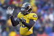 KANSAS CITY, MO - NOVEMBER 29: Gilbert Moye #10 of the Missouri Tigers celebrates on the field during the game against the Kansas Jayhawks on November 29, 2008 at Arrowhead Stadium in Kansas City, Missouri. (Photo by Jamie Squire/Getty Images)