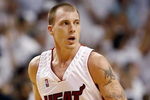 MIAMI - JUNE 2:  Jason Williams #55 of the Miami Heat runs back down court after hitting a 3-pointer against the Detroit Pistons in game six of the Eastern Conference Finals during the 2006 NBA Playoffs on June 2, 2006 at American Airlines Arena in Miami, Florida. The Heat defeated the Pistons 95-78 to win the series 4-2 and advance to the NBA Finals.  NOTE TO USER: User expressly acknowledges and agrees that, by downloading and or using this photograph, User is consenting to the terms and conditions of the Getty Images License Agreement. (Photo by Eliot J. Schechter/Getty Images)