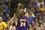 ORLANDO, FL - JUNE 14:  Kobe Bryant #24 of the Los Angeles Lakers points down the court during Game Five of the 2009 NBA Finals against the Orlando Magic on June 14, 2009 at Amway Arena in Orlando, Florida. The Lakers won 99-86. NOTE TO USER:  User expressly acknowledges and agrees that, by downloading and or using this photograph, User is consenting to the terms and conditions of the Getty Images License Agreement. (Photo by Elsa/Getty Images) 