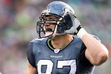 SEATTLE - JANUARY 05:  Defensive end Patrick Kerney #97 of the Seattle Seahawks listens from the field in the first quarter against the Washington Redskins during the NFC Wild Card game at Qwest Field on January 5, 2008 in Seattle, Washington.  (Photo by Otto Greule Jr/Getty Images)