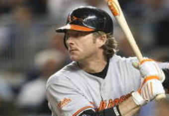 NEW YORK - MAY 21:  Gregg Zaun #9 of the Baltimore Orioles at bat against the New York Yankees on May 21, 2009 at Yankee Stadium in the Bronx borough of New York City.  (Photo by Nick Laham/Getty Images)