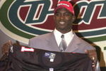21 Apr 2001:  Michael Vick poses after he was selected first in the NFL Draft by the Atlanta Falcons at Madison Square Garden in New York City. Mandatory Credit: Ezra Shaw/ALLSPORT