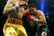 ATLANTIC CITY, NJ  - APRIL 12: Kermit Cintron (L) throws a punch during his IBF World Welterweight Title bout against Antonio Margarito at Boardwalk Hall on April 12, 2008 in Atlantic City, New Jersey. (Photo by Jeff Zelevansky/Getty Images)   