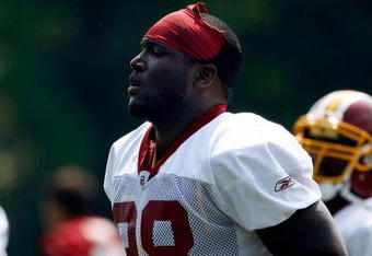 ASHBURN, VA - AUGUST 03:  Defensive end Brian Orakpo #98 of the Washington Redskins warms up during training camp August 3, 2009 in Ashburn, Virginia.  (Photo by Win McNamee/Getty Images)