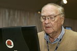 UNITED STATES - NOVEMBER 04:  Furman Bisher of the Atlanta Journal Constitution celebrates his 88th birthday while covering the third round of the THE TOUR Championship at East Lake Golf Club in Atlanta, Georgia, on November 4, 2006.  (Photo by Sam Greenwood/Getty Images)