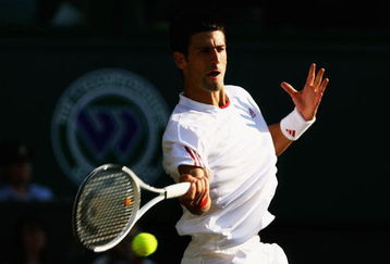 WIMBLEDON, ENGLAND - JUNE 26:  Novak Djokovic of Serbia plays a forehand during the men's singles third round match against Mardy Fish of USA on Day Five of the Wimbledon Lawn Tennis Championships at the All England Lawn Tennis and Croquet Club on June 26, 2009 in London, England.  (Photo by Paul Gilham/Getty Images)