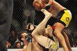 PHILADELPHIA - AUGUST 08:  (Top) Anderson Silva battles  Forrest Griffin during their light heavyweight bout at UFC 101: Declaration at the Wachovia Center on August 8, 2009 in Philadelphia, Pennsylvania.  (Photo by Jon Kopaloff/Getty Images)