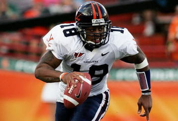 CORAL GABLES, FL - NOVEMBER 26: Quarterback Marques Hagans #18 of the Virginia Cavaliers scrambles against the Miami Hurricanes at the Orange Bowl on November 26, 2005 in Coral Gables, Florida. (Photo by Doug Benc/Getty Images)