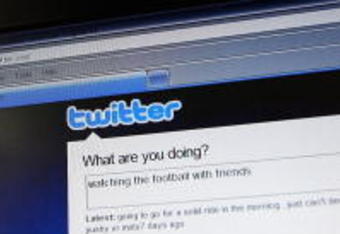 NEWCASTLE, AUSTRALIA - JULY 11:  In this photo illustration the Twitter website is displayed on a mobile phone at a NRL match on July 11, 2009 in Newcastle, Australia. The micro-blogging phenomenon sees users post text 'tweets' of upto 140 characters in response to the question 'What are you doing?'.  (Photo by Cameron Spencer/Getty Images)