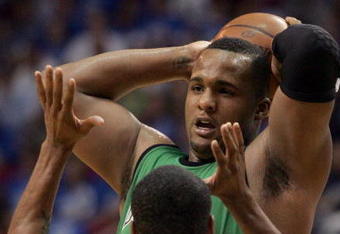 ORLANDO, FL - MAY 08:  Rashard Lewis #9 of the Orlando Magic guards Glen Davis #11 of the Boston Celtics in Game Three of the Eastern Conference Semifinals during the 2009 NBA Playoffs at Amway Arena on May 8, 2009 in Orlando, Florida. The Magic defeated the Celtics 117-96. NOTE TO USER: User expressly acknowledges and agrees that, by downloading and or using this photograph, User is consenting to the terms and conditions of the Getty Images License Agreement.  (Photo by Marc Serota/Getty Images)