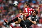 LONDON, ENGLAND - AUGUST 01:  Fran Merida of Arsenal and Raul Garcia of Athletico battle for the ball during the Emirates Cup match between Arsenal and Athletico Madrid at the Emirates Stadium on August 1, 2009 in London, England.  (Photo by Phil Cole/Getty Images)