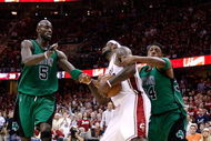 CLEVELAND - MAY 12: LeBron James #23 of the Cleveland Cavaliers is fouled as he is grapped from behind by Paul Pierce #34 of the Boston Celtics as Kevin Garnett #5 of the Celtics trails on the play in Game Four of the 2008 NBA Eastern Conference Semifinals on May 12, 2008 at the Quicken Loans Arena in Cleveland, Ohio. NOTE TO USER: User expressly acknowledges and agrees that, by downloading and or using this photograph, User is consenting to the terms and conditions of the Getty Images License Agreement. (Photo by Gregory Shamus/Getty Images)