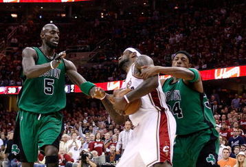 CLEVELAND - MAY 12:  LeBron James #23 of the Cleveland Cavaliers is fouled as he is grapped from behind by Paul Pierce #34 of the Boston Celtics as Kevin Garnett #5 of the Celtics trails on the play in Game Four of the 2008 NBA Eastern Conference Semifinals on May 12, 2008 at the Quicken Loans Arena in Cleveland, Ohio. NOTE TO USER: User expressly acknowledges and agrees that, by downloading and or using this photograph, User is consenting to the terms and conditions of the Getty Images License Agreement.  (Photo by Gregory Shamus/Getty Images)