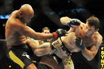 PHILADELPHIA - AUGUST 08:  (L-R) Anderson Silva battles  Forrest Griffin during their light heavyweight bout at UFC 101: Declaration at the Wachovia Center on August 8, 2009 in Philadelphia, Pennsylvania.  (Photo by Jon Kopaloff/Getty Images)