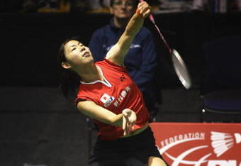 AUCKLAND, NEW ZEALAND - AUGUST 01:  Sayaka Sato of Japan competes against Maria Febe Kusumastuti of Indonesia in the women's single final during the 2009 New Zealand Badminton Open at North Shore Events Centre on August 1, 2009 in Auckland, New Zealand.  (Photo by Sandra Mu/Getty Images)