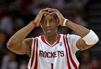 HOUSTON - APRIL 21:  Tracy McGrady #1 of the Houston Rockets reacts during the game with the Utah Jazz in Game Two of the Western Conference Quarterfinals during the 2008 NBA Playoffs at the Toyota Center April 21, 2008 in Houston, Texas.  The Jazz won 90-84.  NOTE TO USER: User expressly acknowledges and agrees that, by downloading and or using this photograph, User is consenting to the terms and conditions of the Getty Images License Agreement. (Photo by Stephen Dunn/Getty Images)