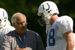TERRE HAUTE, IN - JULY 28:  Offensive coordinator Tom Moore talks with Peyton Manning #18 during the Indianapolis Colts training camp July 28, 2005 at the Rose-Hulman Institute of Technology in Terre Haute, Indiana.  (Photo by Elsa/Getty Images)
