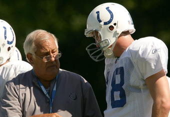 TERRE HAUTE, IN - JULY 28:  Offensive coordinator Tom Moore talks with Peyton Manning #18 during the Indianapolis Colts training camp July 28, 2005 at the Rose-Hulman Institute of Technology in Terre Haute, Indiana.  (Photo by Elsa/Getty Images)