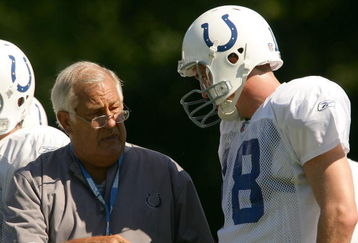 TERRE HAUTE, IN - JULY 28:  Offensive coordinator Tom Moore talks with Peyton Manning #18 during the Indianapolis Colts training camp July 28, 2005 at the Rose-Hulman Institute of Technology in Terre Haute, Indiana.  (Photo by Elsa/Getty Images)
