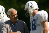 TERRE HAUTE, IN - JULY 28:  Offensive coordinator Tom Moore talks with Peyton Manning #18 during the Indianapolis Colts training camp July 28, 2005 at the Rose-Hulman Institute of Technology in Terre Haute, Indiana.  (Photo by Elsa/Getty Images)